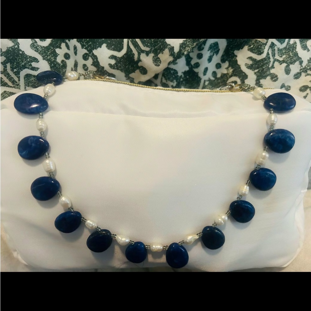 Chic White pearls with Navy blue opal beading.